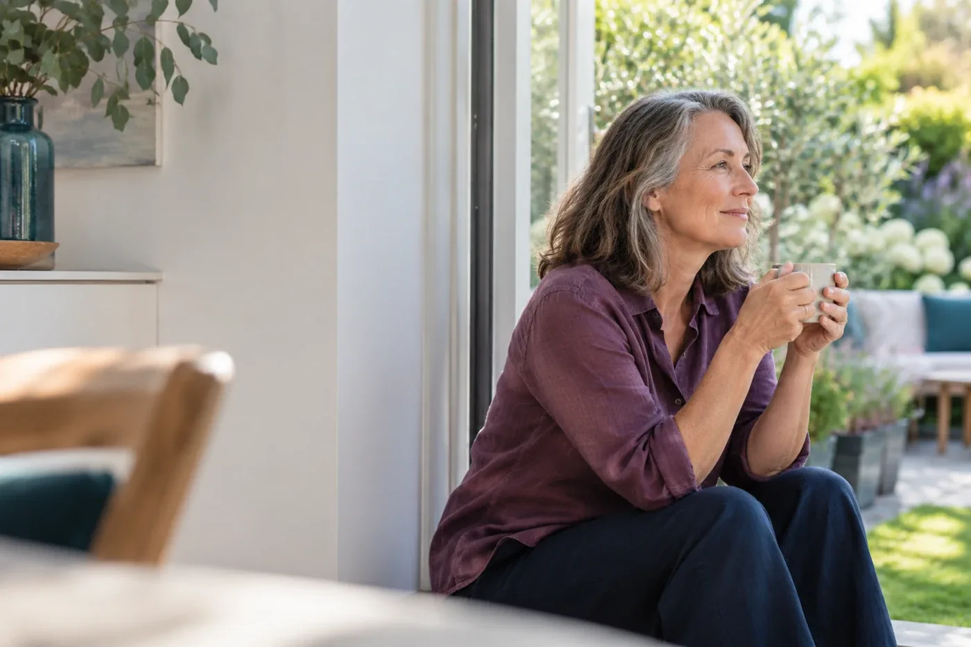 Illustrative portrait of a woman enjoying a quiet moment at home